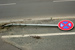 Traffic sign run over by car