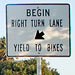 Right lane starts here; yield to bikes